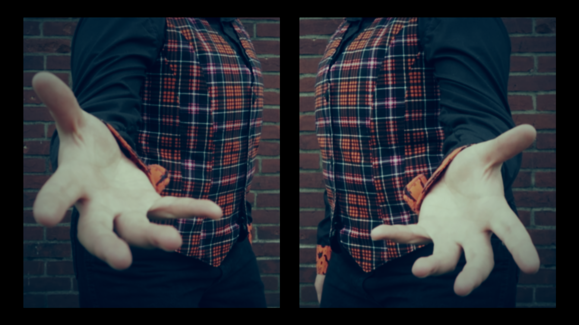 A mirror image of a white figure standing in front of a red brick background. A white hand is held out to the viewer. A white figure standing in front of a red brick background. The figure is wearing a black button down shirt with orange and black bug patterned cuffs and collar. Over the shirt the figure is wearing a black, orange, and purple plaid vest with black buttons.